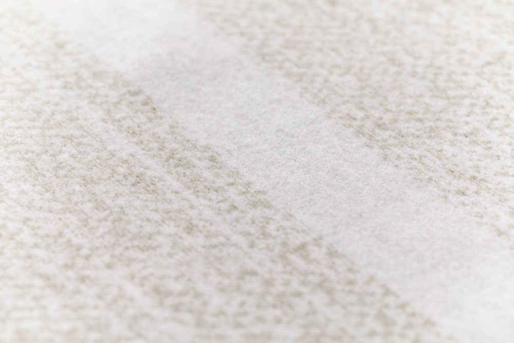 LUCA throw "structured stripe"