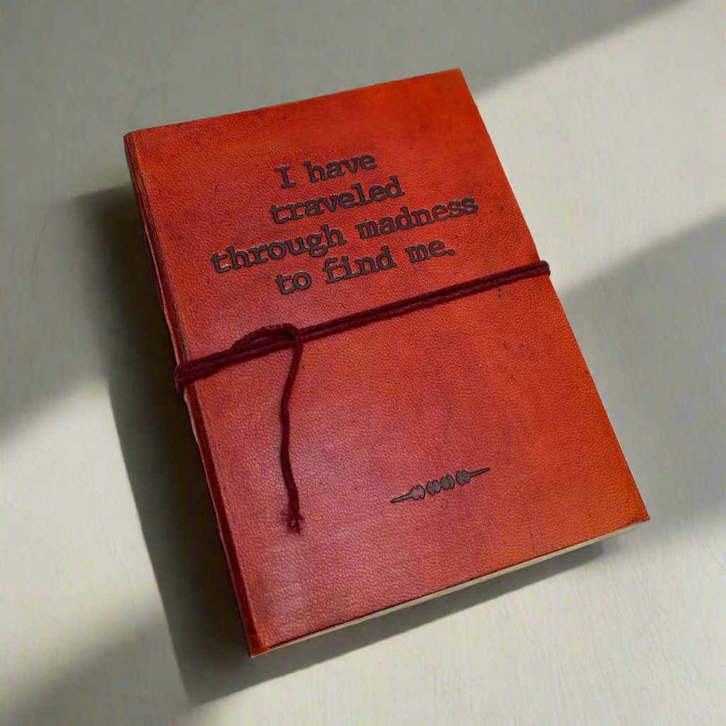 Madness Quote Leather Journal
