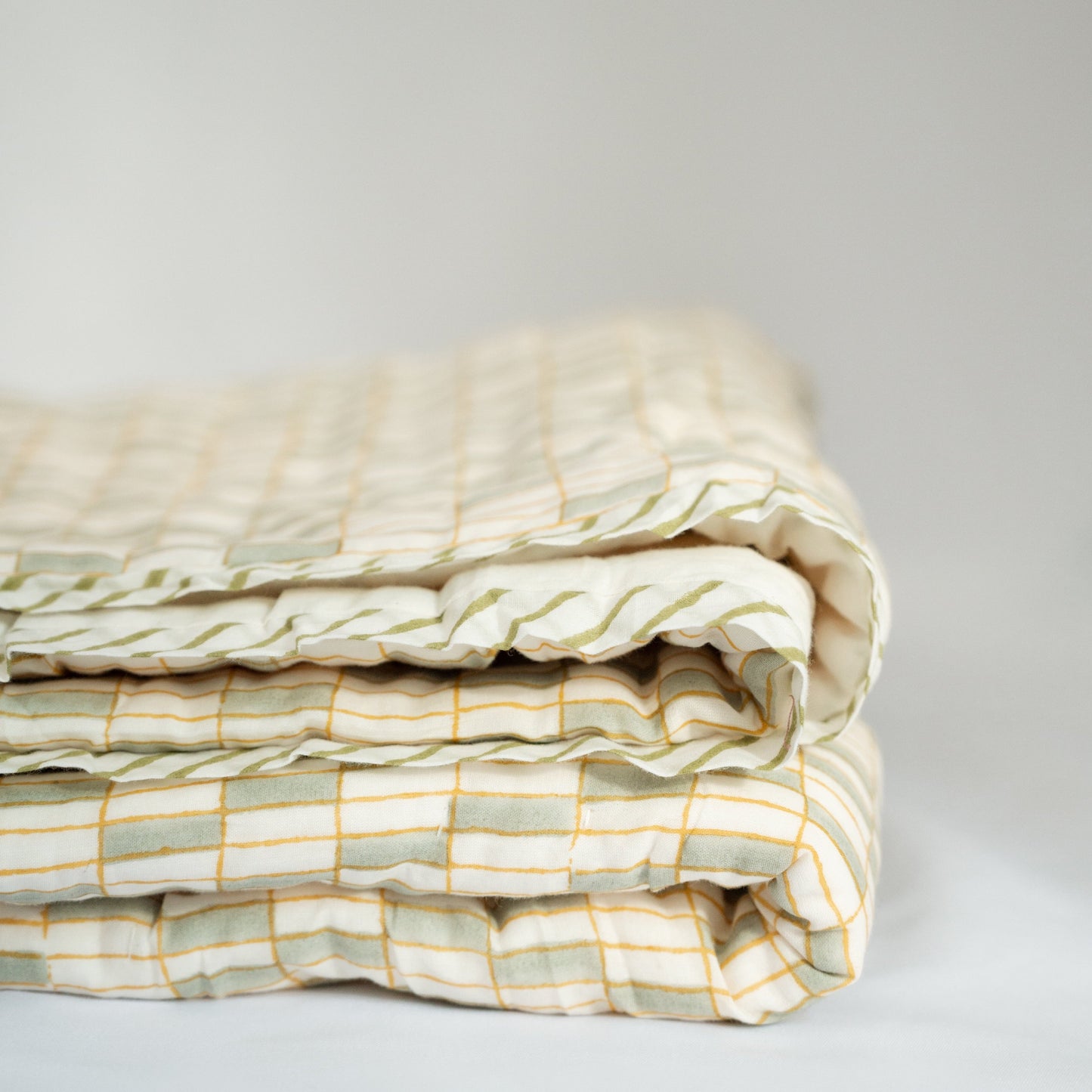 The Mona's Garden - Hand Block Printed Reversible Quilted Throw