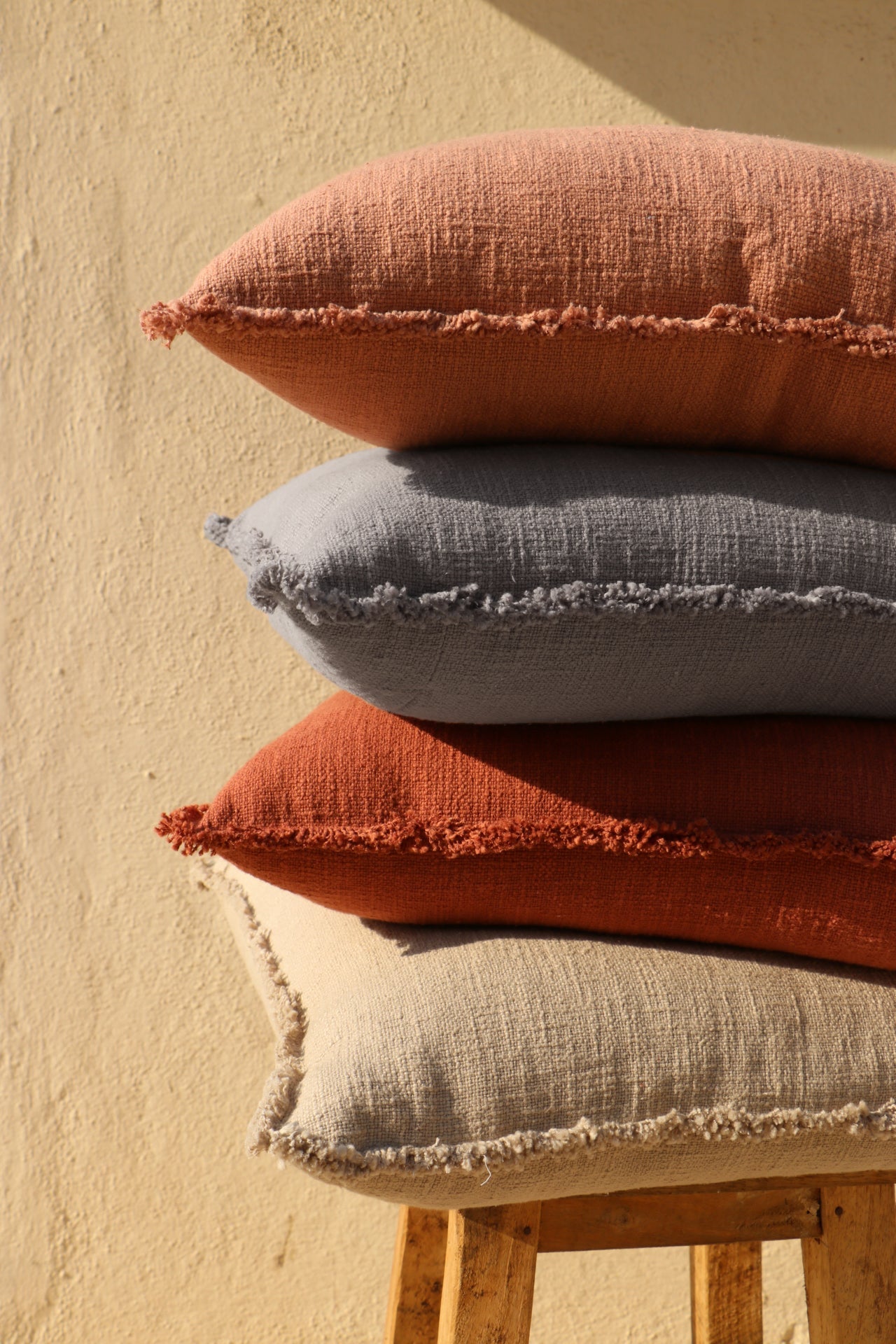 Organic Chic washed textured cotton solid pillow cover with frayed edges