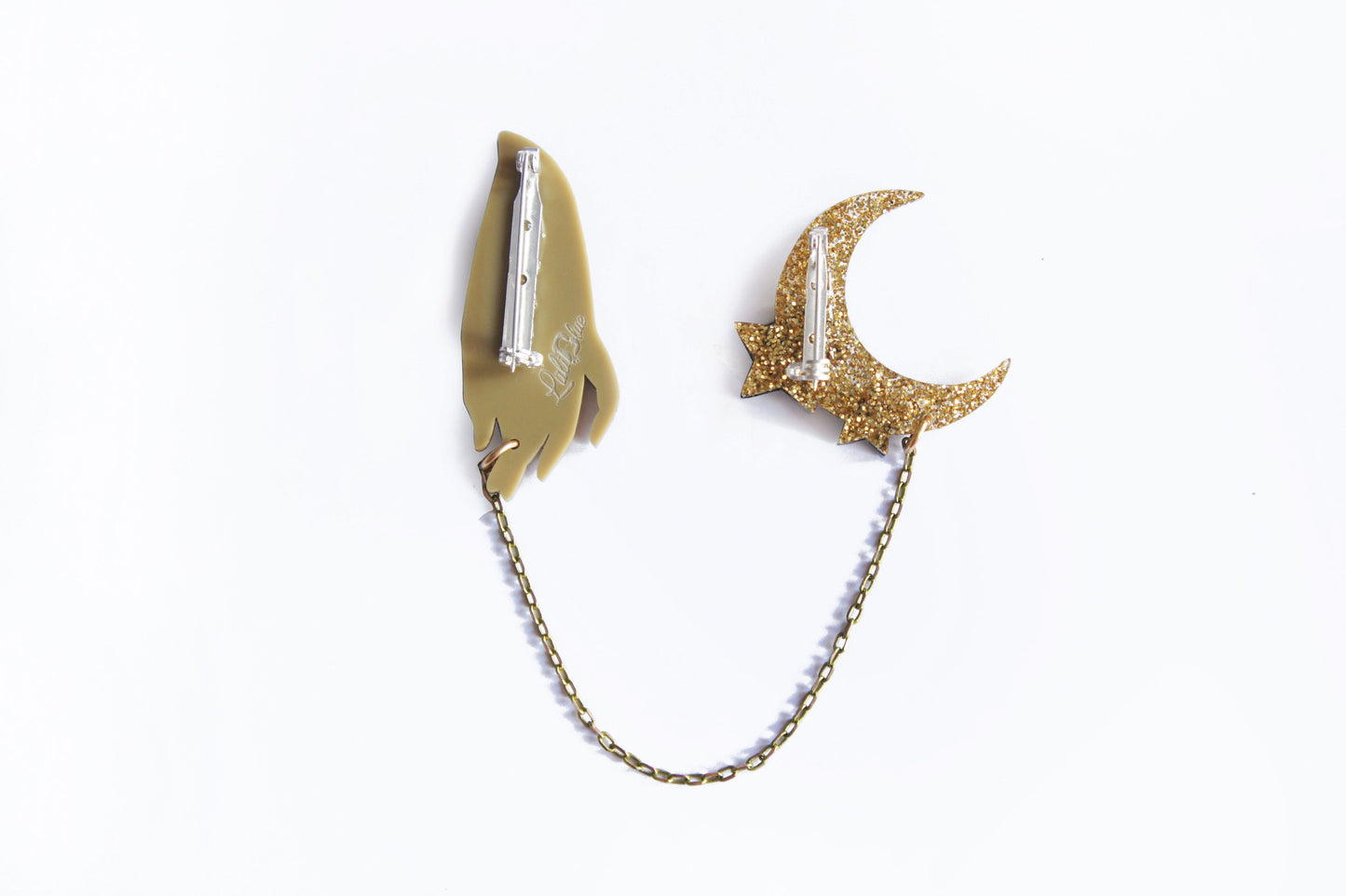 Hand and Moon Double brooch by Laliblue