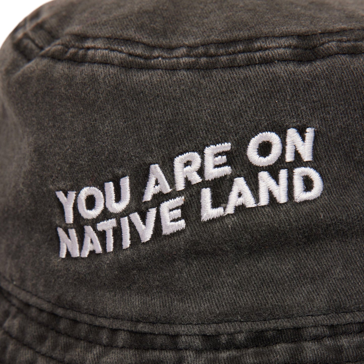 'YOU ARE ON NATIVE LAND' BUCKET HAT - Osadia Concept Store