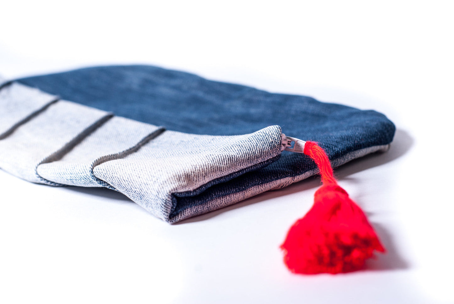 Denim clutch with seam details