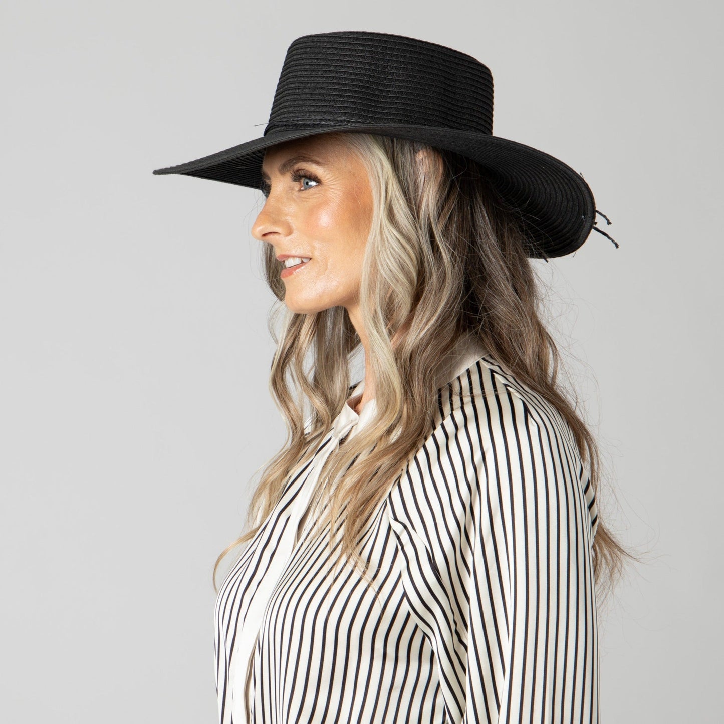 Women's large brim oval crown boater