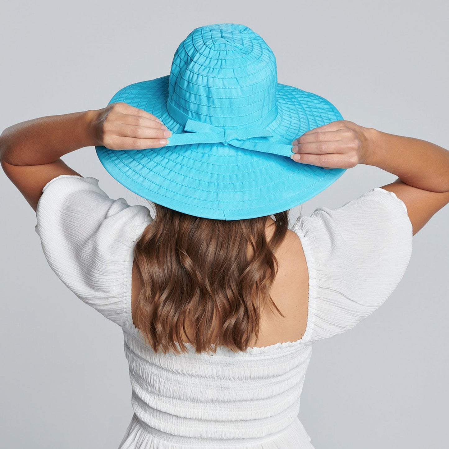 Women's Large Brim Ribbon Hat with a Bow