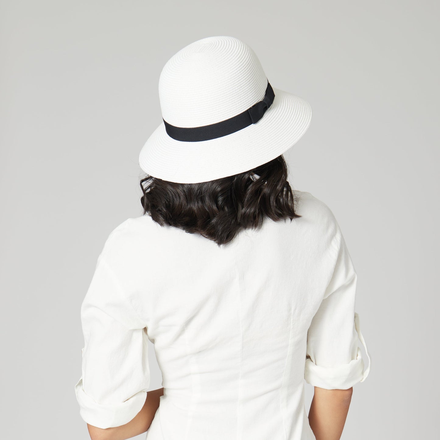 Women's ultrabraid cloche with grosgrain bow trim